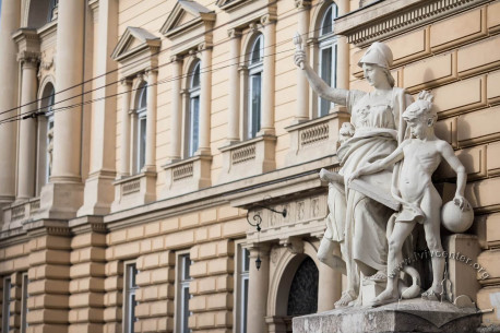 Vul. Universytetska, 1. Sculptural group located on the left of the main entrance