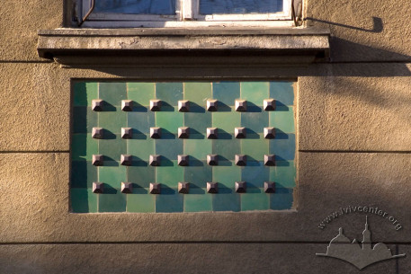 Vul. Henerala Chuprynky, 11a. Ceramic tiles under 3rd floor windows
