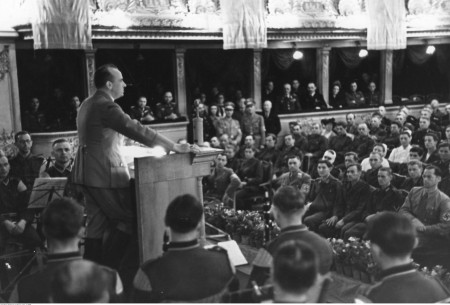 Hans Frank delivers a speech at the Opera theater at the rally of the National Socialist Workers' Party of Germany on the occasion of the first anniversary of the accession of the District of Galicia to the General Government, August 1942.